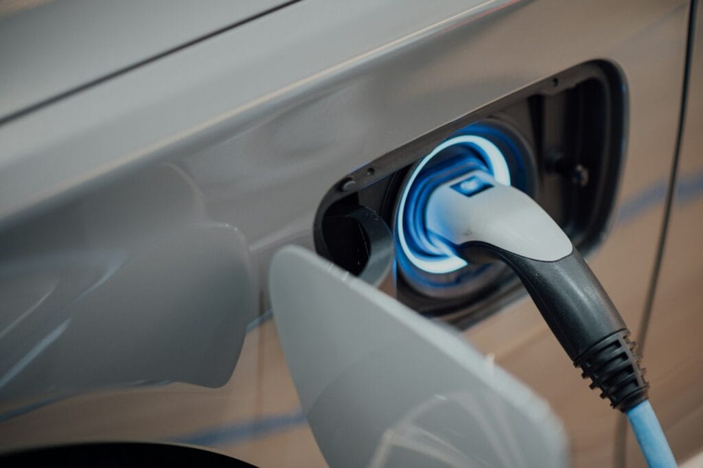 Charging an electric vehicle at home — EV incentives still available in 2026