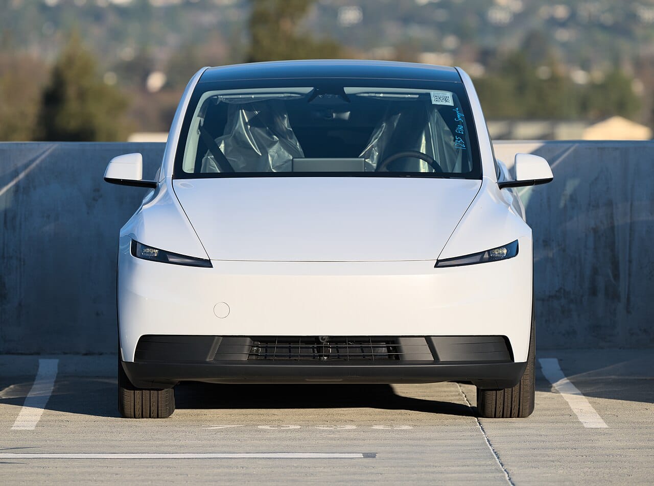 Tesla Model Y vs Mustang Mach-E comparison - Model Y front, 2026