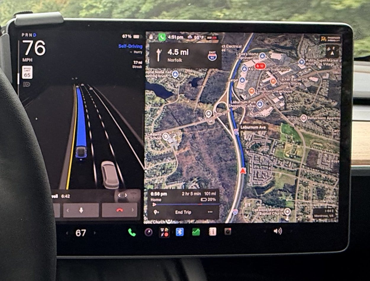 Tesla FSD v14 screen close-up showing Self-Driving engaged at highway speed with live route visualization