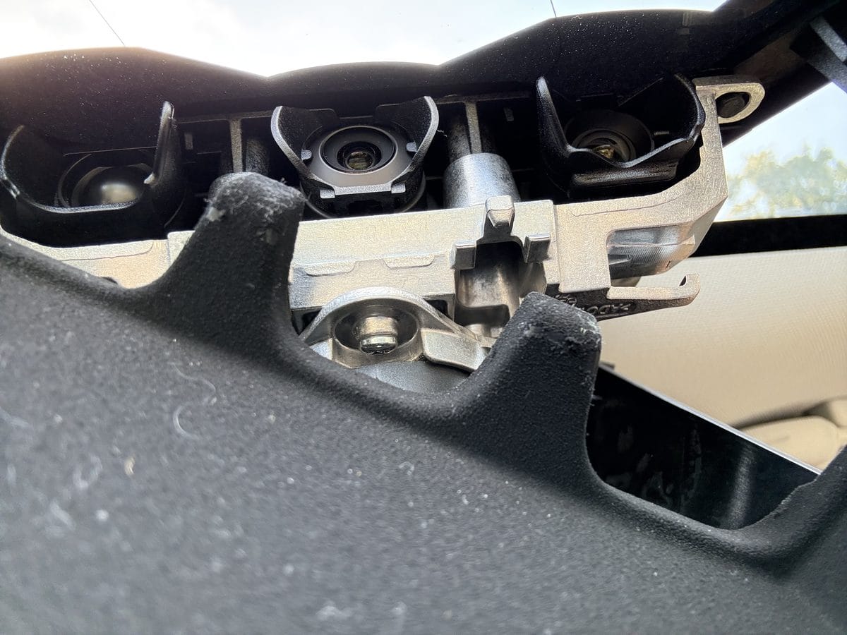 Tesla forward-facing camera cluster up close from inside the windshield