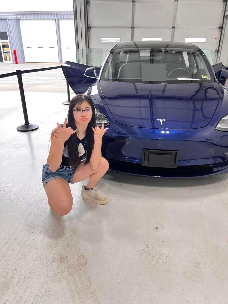 Delivery day: picking up her used 2021 Tesla Model 3 from Tesla
