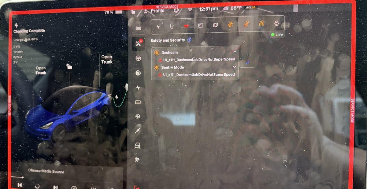 Tesla Service Mode screen showing DashcamUsbDriveNotSuperSpeed alerts for both Dashcam and Sentry Mode