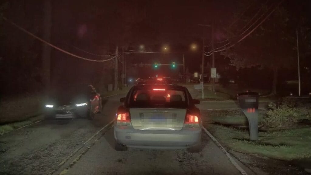 TeslaCam night still from a Tesla Model Y, the frame that shows what the best dash cam for EV use has to beat