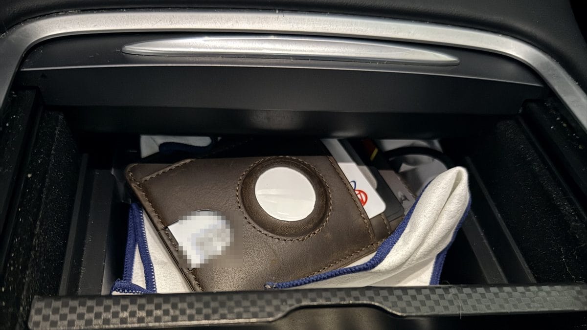 Aftermarket sliding drawer console organizer in a 2023 Tesla Model Y center console