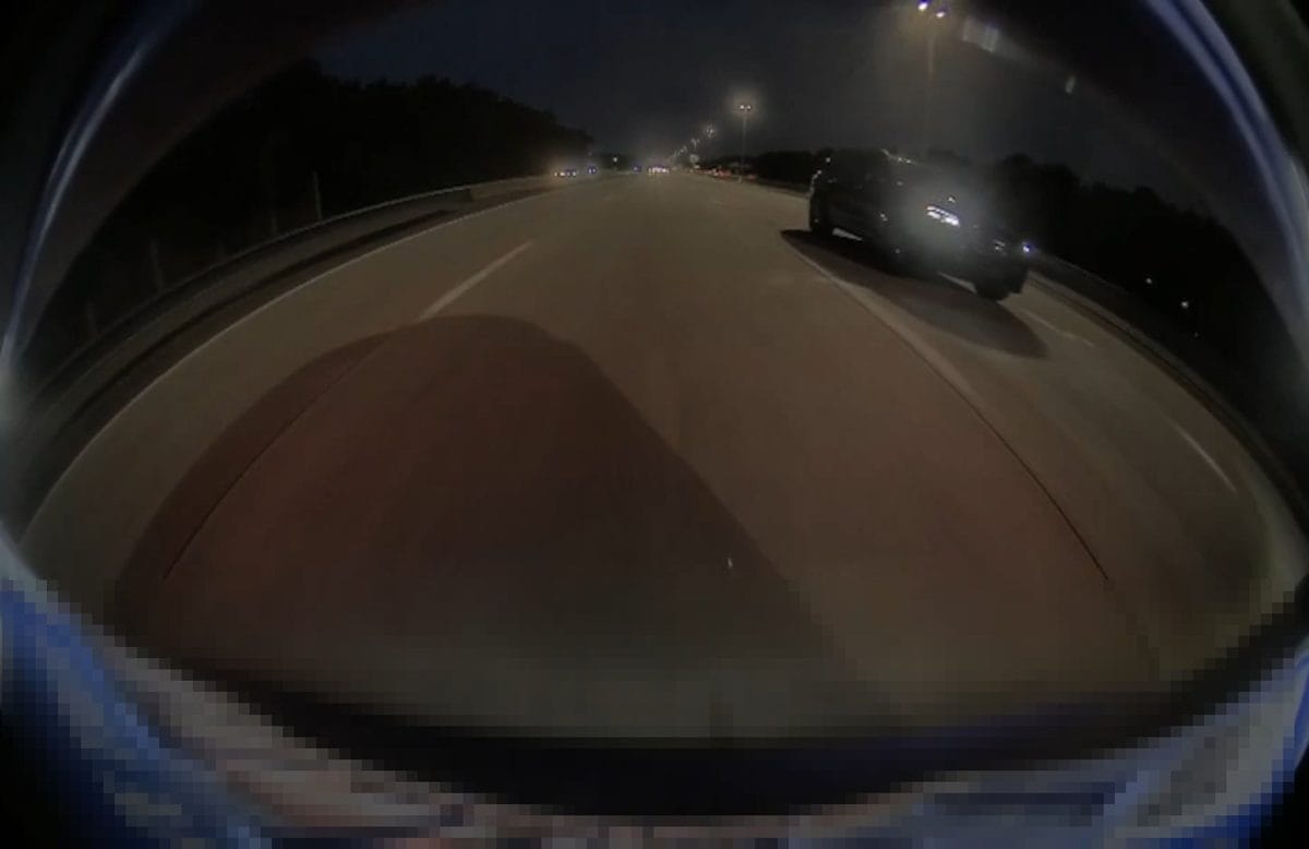TeslaCam rear camera night footage at highway speed, license plate not readable